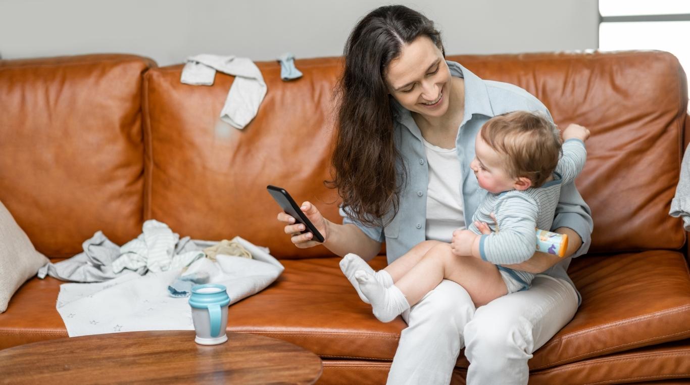 Toddler sitting on mother_s lap