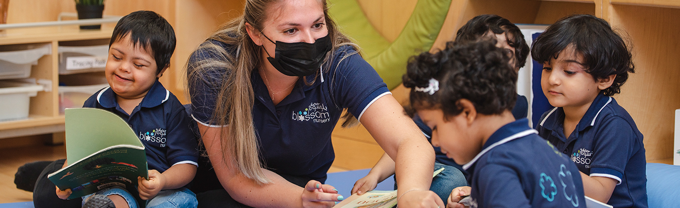 Teacher interacting with children