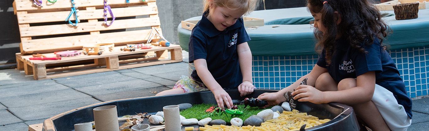 Blossom nursery children playing with sensory items