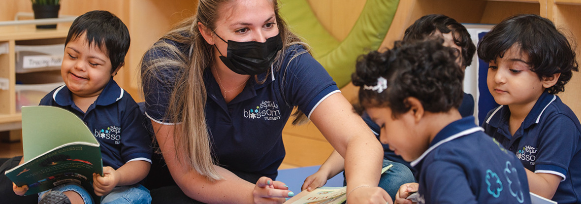 Teacher interacting with children