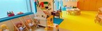 Nursery class room with toys and tables