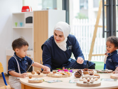 teacher with students sharjah